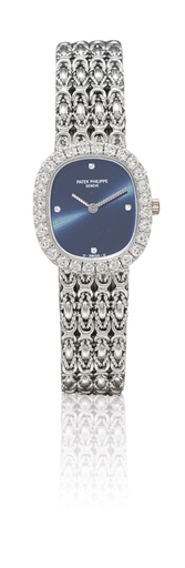 PATEK PHILIPPE, REF. 4734/1G.LADY'S 18K WHITE GOLD AND DIAMOND-SET OVAL BRACELET WATCH