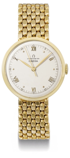 Omega. A large and attractive 18K gold wristwatch with indirect centre seconds and bracelet