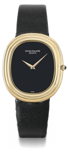 Patek Philippe. An 18K gold oval automatic wristwatch with onyx dial