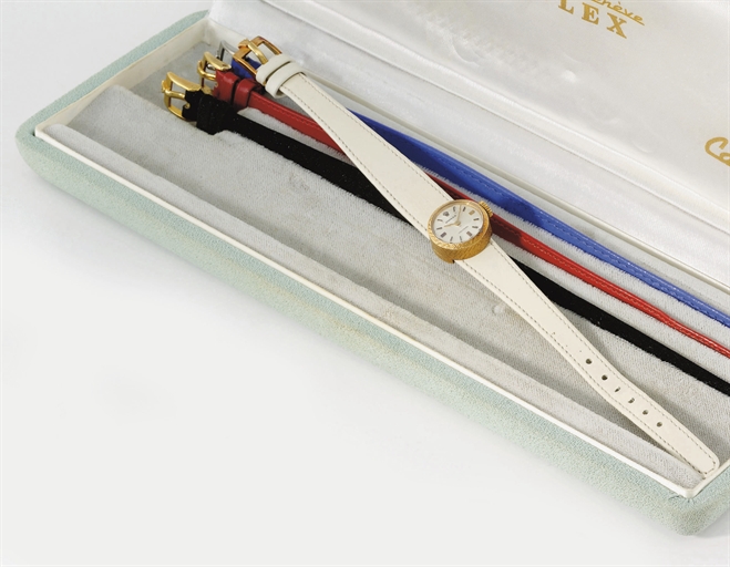 Rolex. An unusual 18K pink gold ladies wristwatch with three additional leather straps and original box