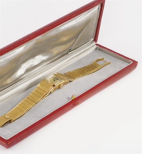 Patek Philippe. A fine, rare and unusual 18K gold bracelet watch with original box
