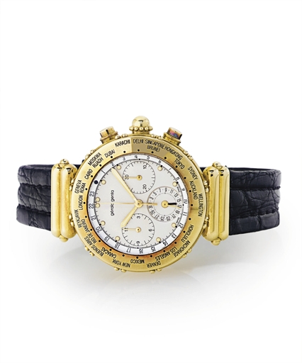 GERALD GENTA. AN 18K GOLD AUTOMATIC WORLD TIME WRISTWATCH WITH DATE AND 24 HOURS