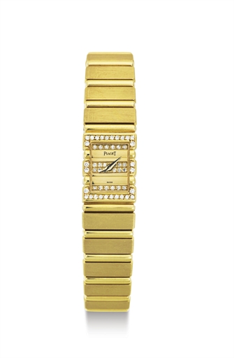 PIAGET. A LADY'S GOLD AND DIAMOND BRACELET WATCH