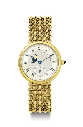BREGUET. AN 18K GOLD WRISTWATCH WITH MOON PHASES AND BRACELET