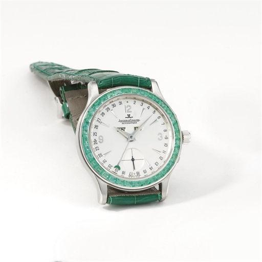 Jaeger-LeCoultre. A fine and rare platinum and emerald-set automatic triple calendar wristwatch