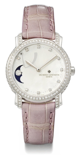Vacheron Constantin. A lady's fine and attractive 18K white gold and diamond-set wristwatch with power reserve, moon phases and mother-of-pearl dial