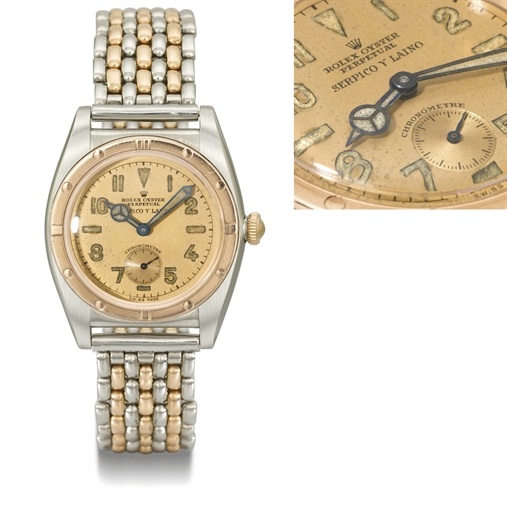 Rolex. A very rare and attractive stainless steel and pink gold automatic bubble back wristwatch with pink dial and bracelet