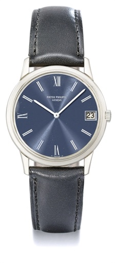 Patek Philippe. An 18K white gold automatic wristwatch with date