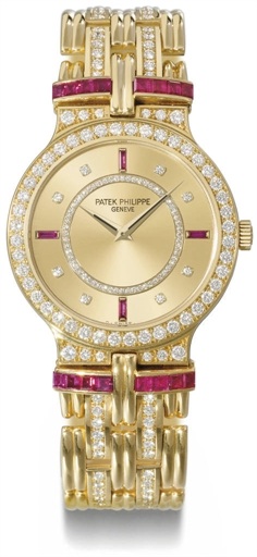 Patek Philippe. A fine, rare and unusual 18K gold, diamond and ruby-set wristwatch with bracelet