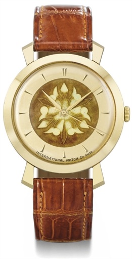IWC. A fine and rare 18K gold wristwatch with sweep centre seconds and cloisonn