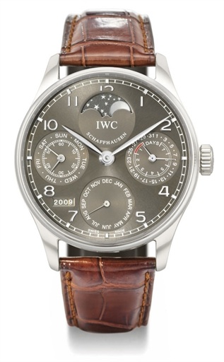 IWC. A rare and oversized 18K white gold automatic perpetual calendar wristwatch with 7-day power reserve and moon phases