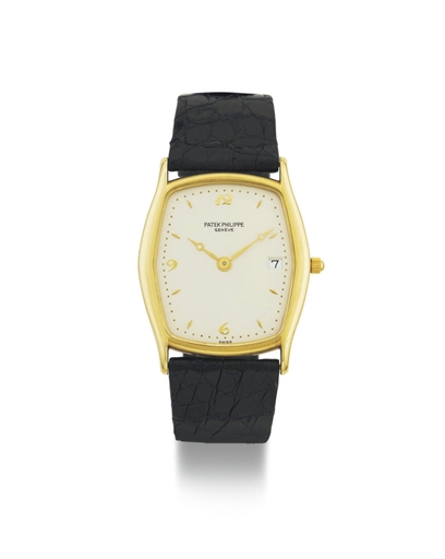 PATEK PHILIPPE. AN 18K GOLD WRISTWATCH WITH DATE