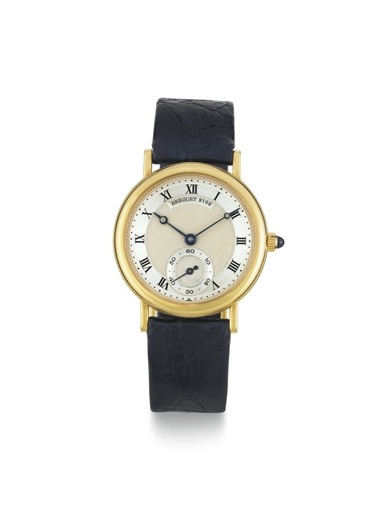BREGUET. AN 18K GOLD WRISTWATCH