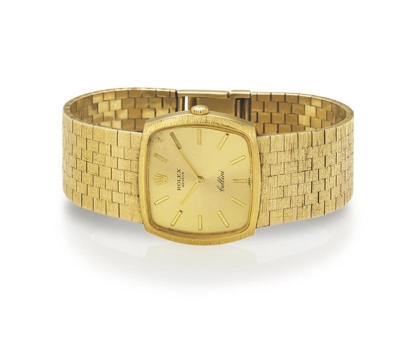 ROLEX. AN 18K GOLD WRISTWATCH WITH BRACELET