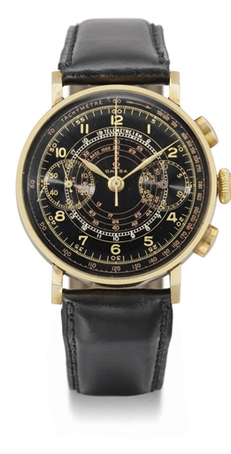 Omega. A large and attractive 14K gold chronograph wristwatch with black dial