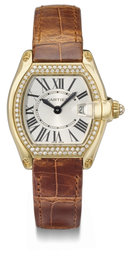 Cartier. A fine 18K gold and diamond-set tonneau-shaped wristwatch with date