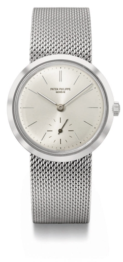 Patek Philippe. A fine, rare and unusual stainless steel water-resistant convertible wristwatch with bracelet