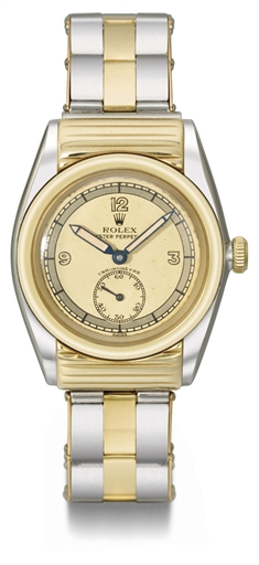 Rolex. A very rare and attractive stainless steel and gold automatic bubble back wristwatch with ribbed hooded lugs, two-tone champagne dial and bracelet