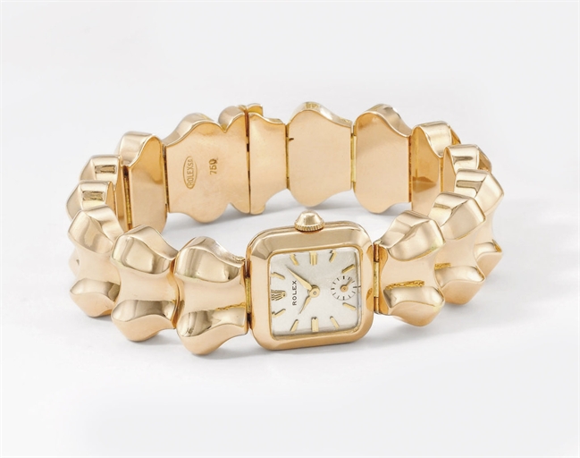 Rolex. A lady's unusual square 18K pink gold wristwatch with fancy link bracelet