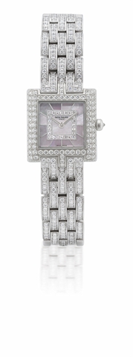 PATEK PHILIPPE, REF.4874/1G.LADY'S WHITE GOLD AND DIAMOND-SET QUARTZ BRACELET WATCH WITH MOTHER-OF-PEARL DIAL