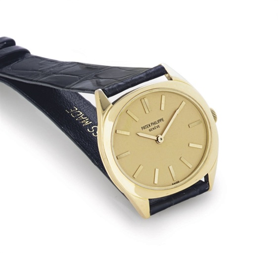 PATEK PHILIPPE. AN 18K GOLD WRISTWATCH