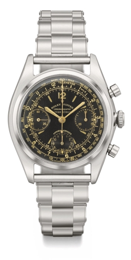 Rolex. A very fine and rare stainless steel chronograph wristwatch with black lacquer dial and bracelet