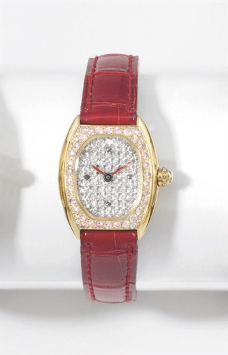 Gerald Genta. A lady's fine 18K pink gold, diamond and ruby-set oval wristwatch