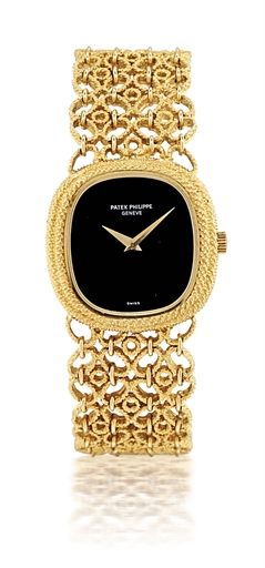 PATEK PHILIPPE, REF. 4285.LADY'S YELLOW GOLD MANUALLY-WOUND BRACELET WATCH WITH ONYX DIAL