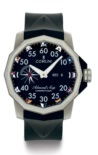 CORUM. AN OVERSIZED TITANIUM AUTOMATIC WRISTWATCH WITH DAY AND DATE