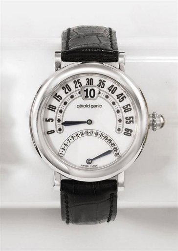 Gerald Genta. An 18K white gold automatic retrograde jump hour wristwatch with date