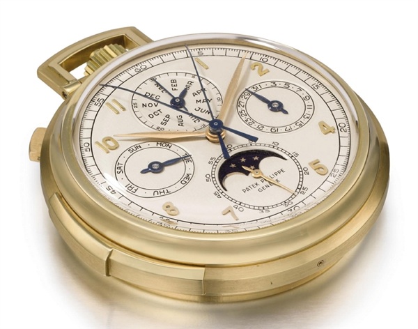 Patek Philippe. A fine and rare 18K gold openface minute repeating perpetual calendar split seconds chronograph keyless lever watch with phases of the moon
