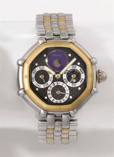 Gerald Genta. A stainless steel and gilt octagonal perpetual calendar wristwatch with moon phases and bracelet