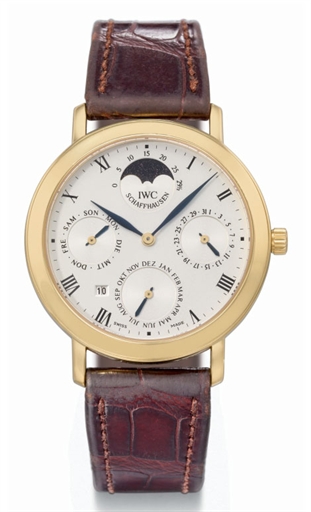 IWC. A fine and slim 18K gold perpetual calendar wristwatch with moon phases and year display