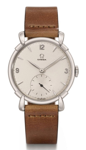 Omega. An unusual and attractive 18K white gold wristwatch with honeycomb dial and fancy lugs