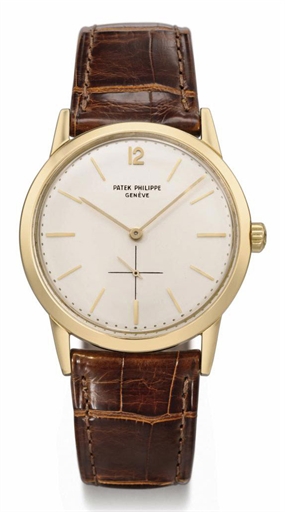 Patek Philippe. A fine and rare 18K gold automatic wristwatch with original certificate