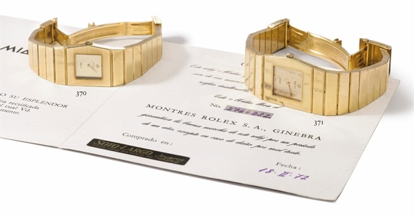 Rolex. An 18K gold asymmetrical left-handed wristwatch with bracelet