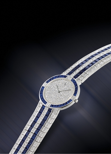CORUM.IMPRESSIVE PLATINUM, DIAMOND AND SAPPHIRE-SET QUARTZ WRISTWATCH WITH BRACELET