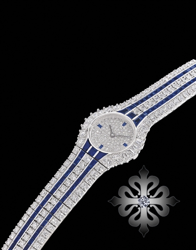 PATEK PHILIPPE, REF. 4787/1G.VERY FINE AND IMPRESSIVE WHITE GOLD, DIAMOND AND SAPPHIRE-SET QUARTZ BRACELET WATCH