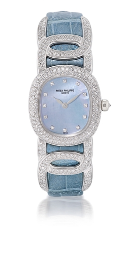 PATEK PHILIPPE, REF. 4832G, GOLDEN ELLIPSE.LADY'S OVAL WHITE GOLD, MOTHER-OF-PEARL AND DIAMOND-SET QUARTZ WRISTWATCH WITH UNUSUAL LUGS