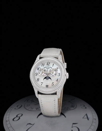 PATEK PHILIPPE, REF. 4937G.WHITE GOLD AND DIAMOND-SET AUTOMATIC ANNUAL CALENDAR WRISTWATCH WITH MOTHER-OF-PEARL DIAL