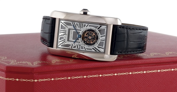 CARTIER. A FINE AND RARE OVERSIZED 18K WHITE GOLD RECTANGULAR WRISTWATCH WITH FLYING TOURBILLON