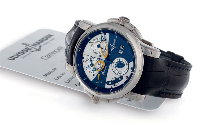 ULYSSE NARDIN. AN UNUSUAL LARGE 18K WHITE GOLD AUTOMATIC DUAL TIME WRISTWATCH WITH DATE, CENTER SECONDS, COUNTDOWN INDICATOR AND MUSICAL ALARM