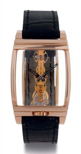 CORUM. A FINE AND LARGE LIMITED EDITION CURVED TONNEAU SKELETONIZED WRISTWATCH