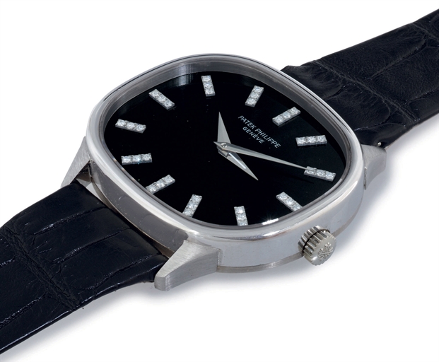 PATEK PHILIPPE. A FINE 18K WHITE GOLD AND DIAMOND CUSHION DUAL TIME WRISTWATCH WITH BLACK DIAL