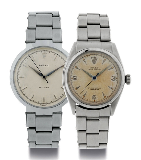ROLEX. A PAIR OF STAINLESS STEEL WRISTWATCHES WITH CENTER SECONDS AND BRACELETS