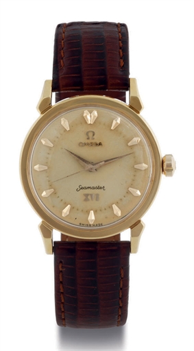 OMEGA. AN 18K GOLD AUTOMATIC WRISTWATCH WITH CENTER SECONDS