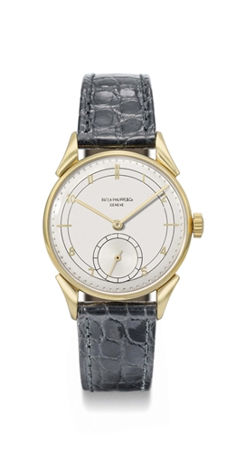Patek Philippe. A fine and attractive 18K gold wristwatch with unusual two-tone silvered dial and lugs