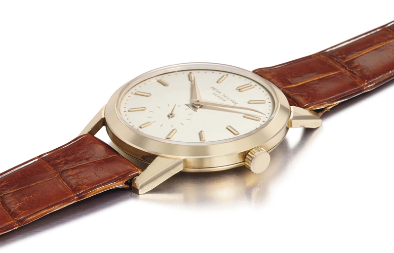 Patek Philippe. A fine and very rare 18K pink gold wristwatch with enamel dial