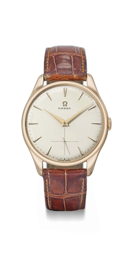 Omega. A large and attractive 18K pink gold wristwatch with honeycomb dial