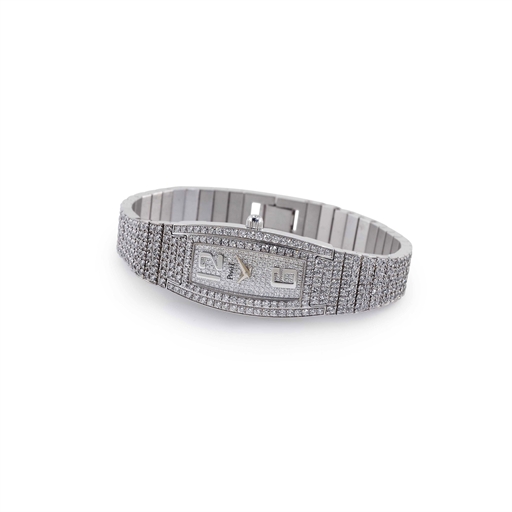 PIAGET. A LADY'S FINE 18K WHITE GOLD AND DIAMOND TONNEAU BRACELET WATCH